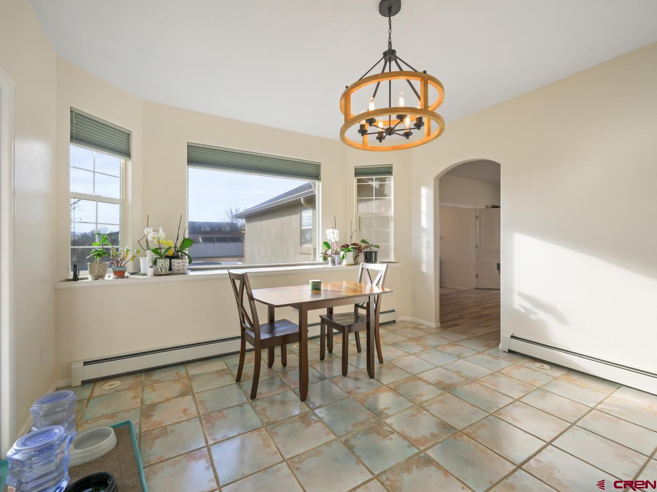 895 24 1/2 Road Grand Junction, CO 81505 - Photo 14 of 42 a dining room with furniture and window