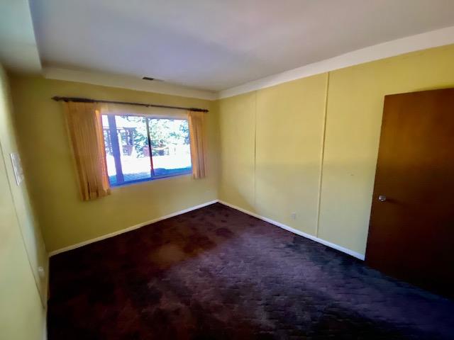 1300 La Honda Road Hillsborough, CA 94010 - Photo 12 of 17 a view of an empty room with a window