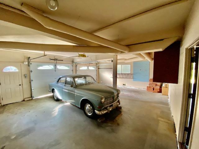 1300 La Honda Road Hillsborough, CA 94010 - Photo 14 of 17 a car parked in garage