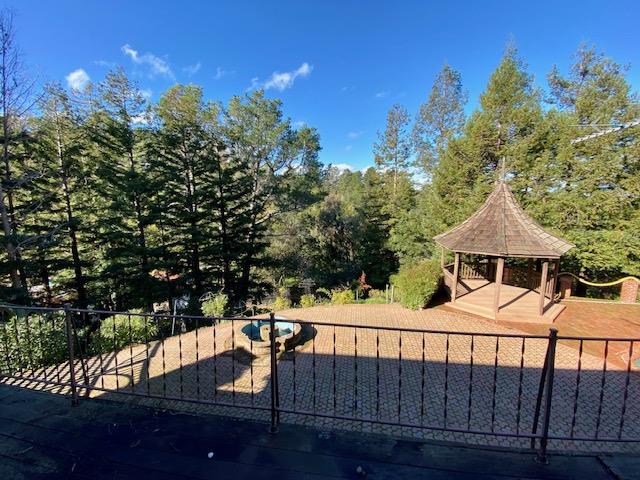 1300 La Honda Road Hillsborough, CA 94010 - Photo 15 of 17 a view of a chairs and table on the wooden floor