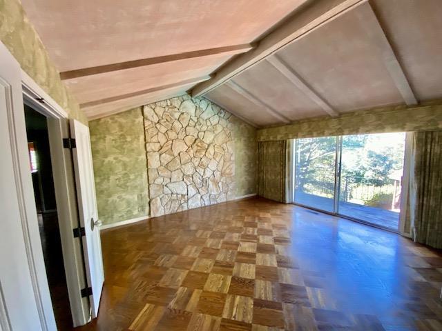 1300 La Honda Road Hillsborough, CA 94010 - Photo 8 of 17 a view of empty room with wooden floor and fan