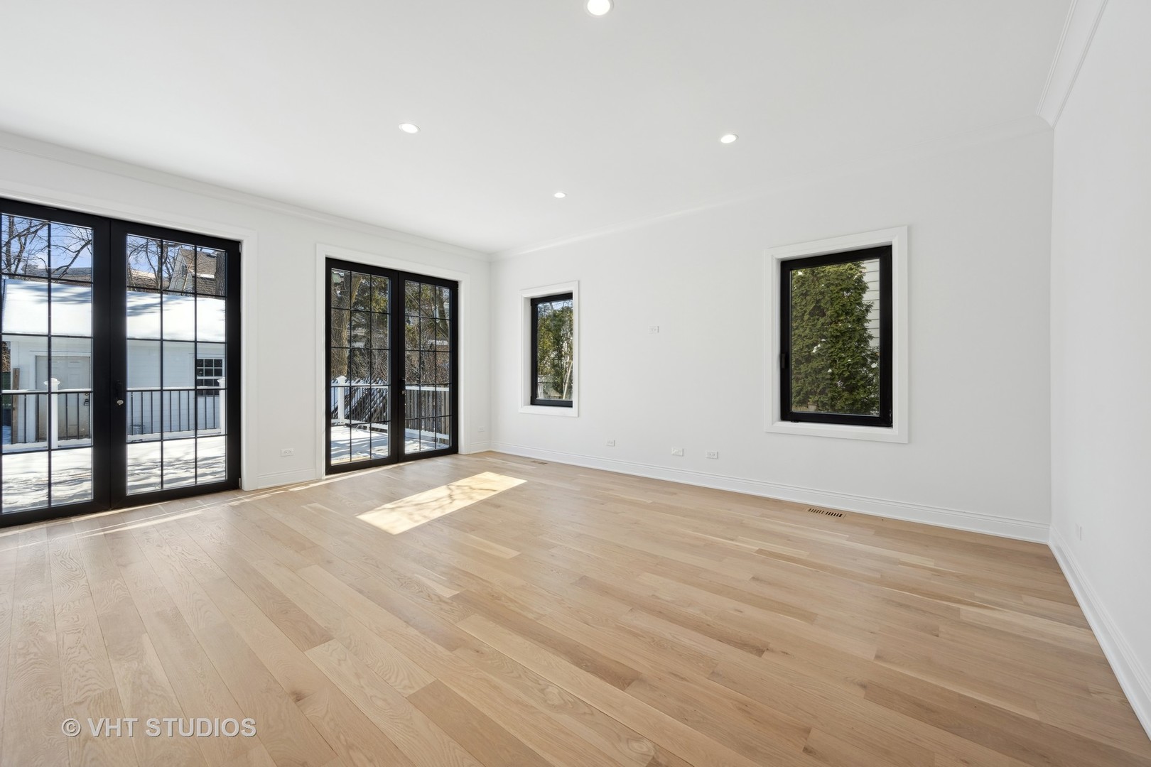 399 Ridge Avenue Winnetka, IL 60093 - Photo 15 of 45 a view of an empty room with glass door