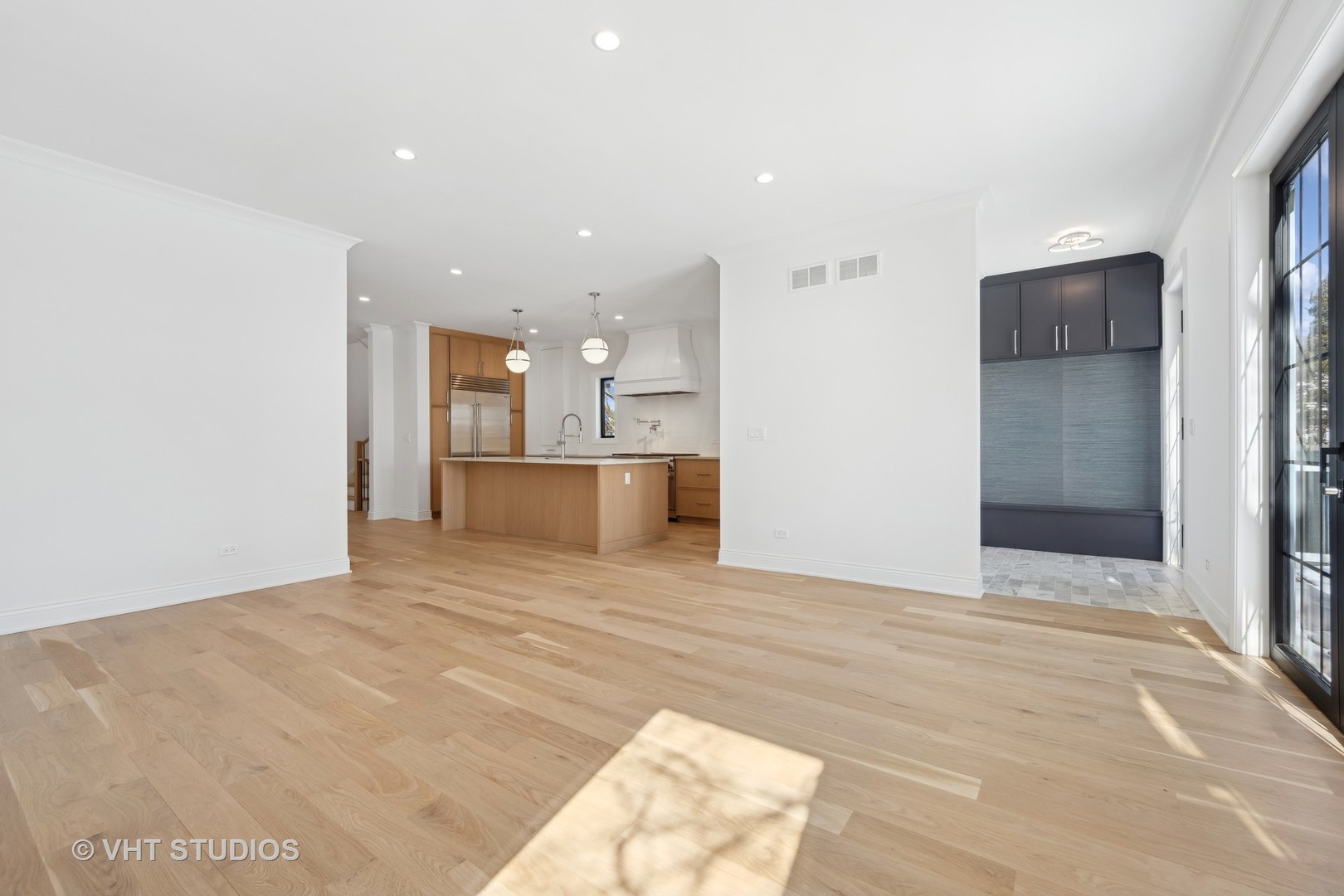 399 Ridge Avenue Winnetka, IL 60093 - Photo 16 of 45 a view of a kitchen with a refrigerator and a sink