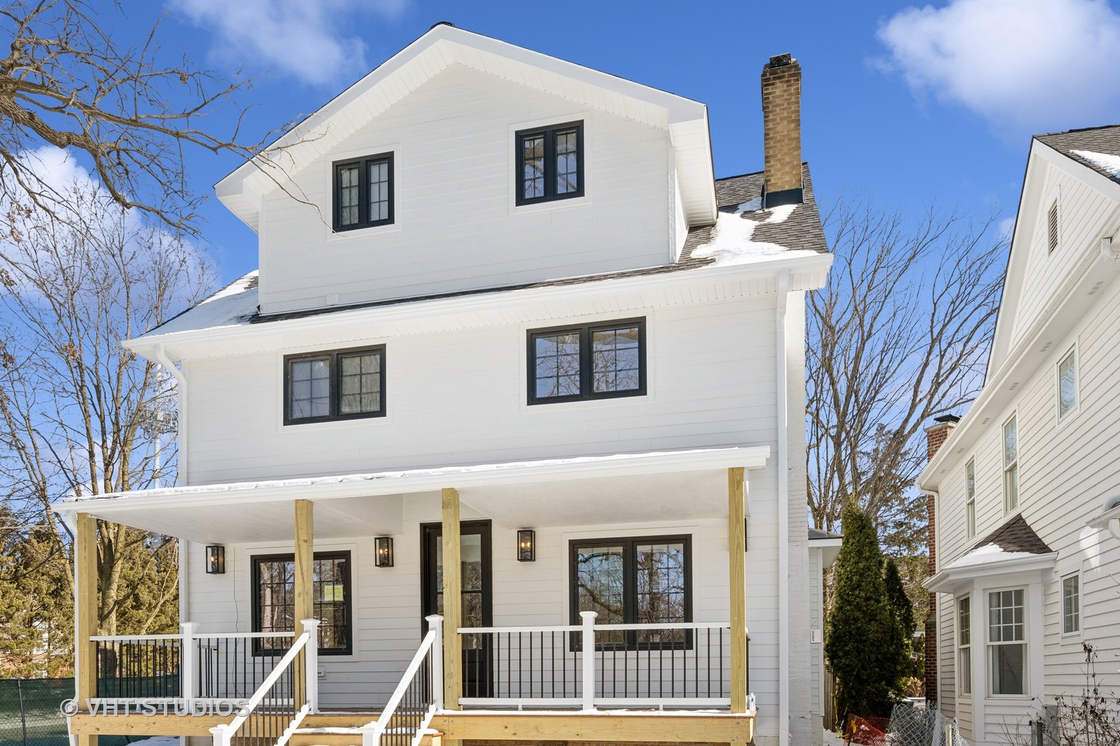 399 Ridge Avenue Winnetka, IL 60093 - Photo 2 of 45 a front view of a building with glass windows