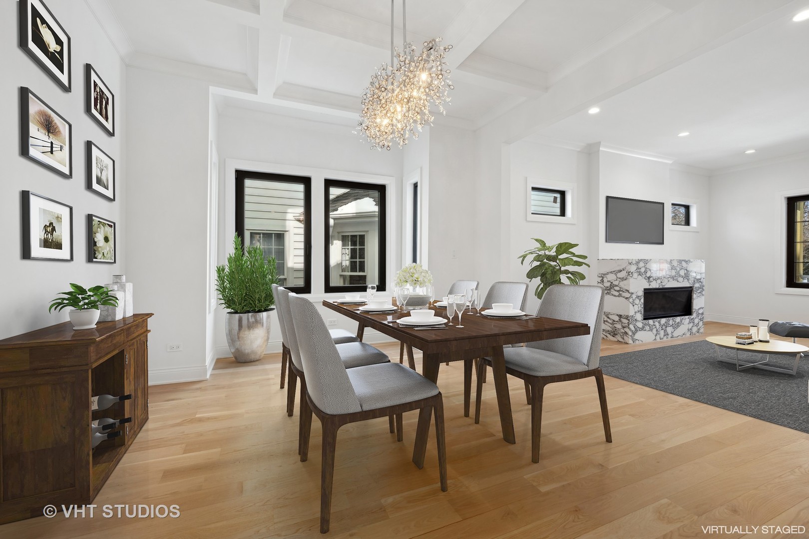 399 Ridge Avenue Winnetka, IL 60093 - Photo 24 of 45 a view of a dining room with furniture and a chandelier