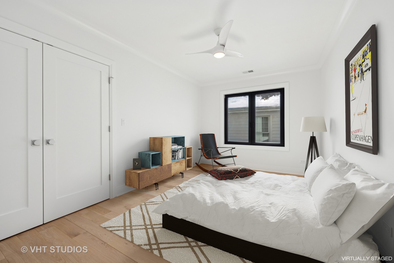 399 Ridge Avenue Winnetka, IL 60093 - Photo 27 of 45 a bedroom with a bed and a large mirror