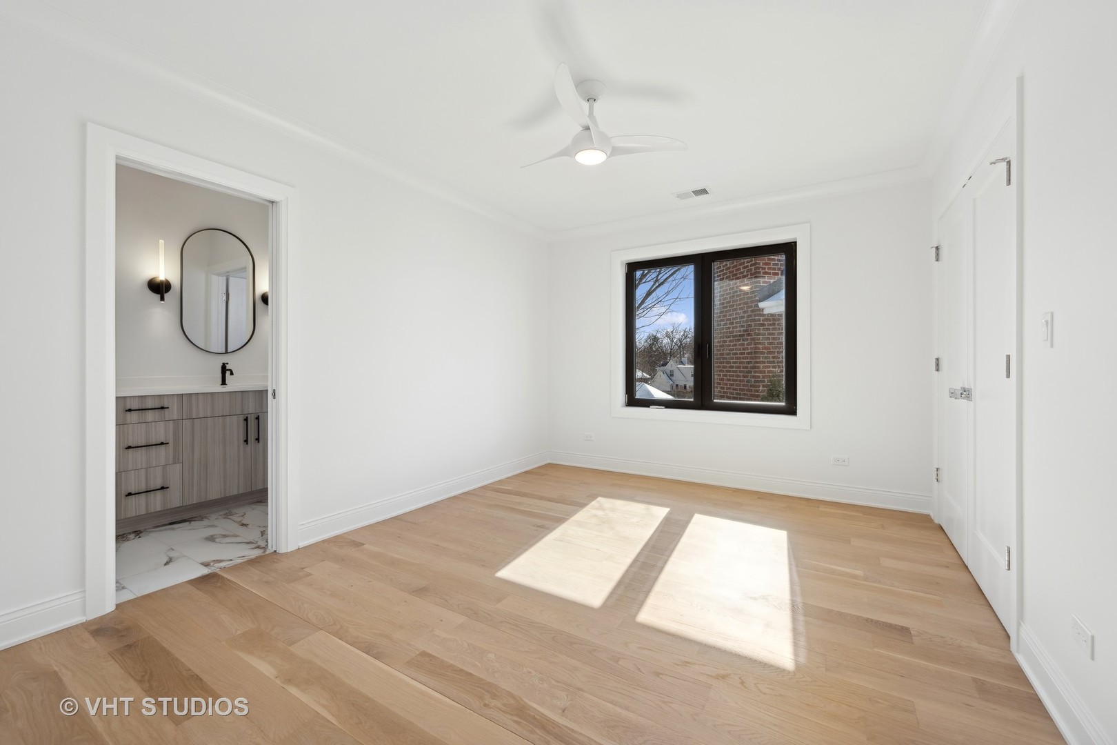 399 Ridge Avenue Winnetka, IL 60093 - Photo 30 of 45 a view of an empty room and window