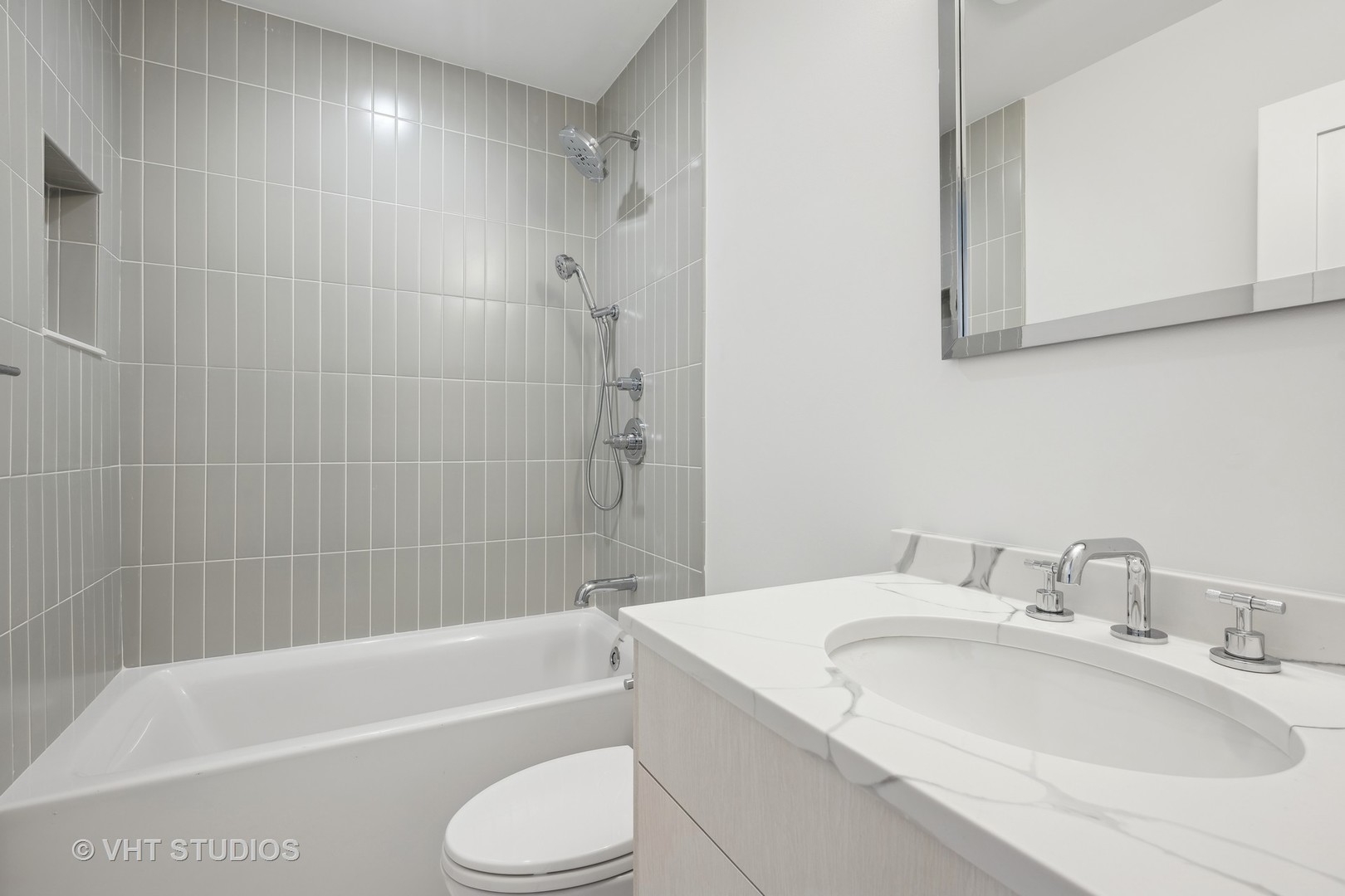 399 Ridge Avenue Winnetka, IL 60093 - Photo 32 of 45 a bathroom with a granite countertop sink toilet and bathtub