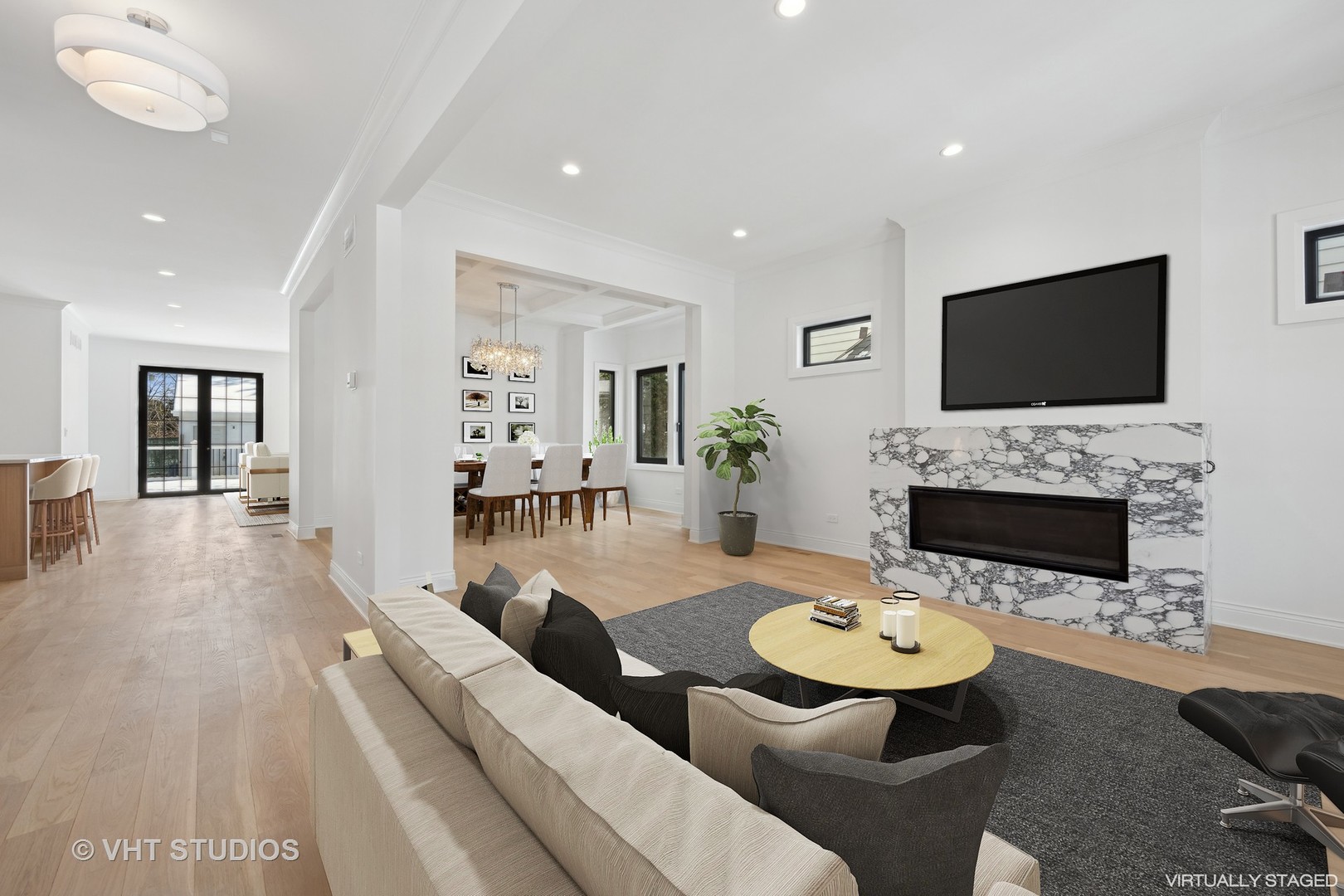 399 Ridge Avenue Winnetka, IL 60093 - Photo 4 of 45 a living room with fireplace furniture and a flat screen tv