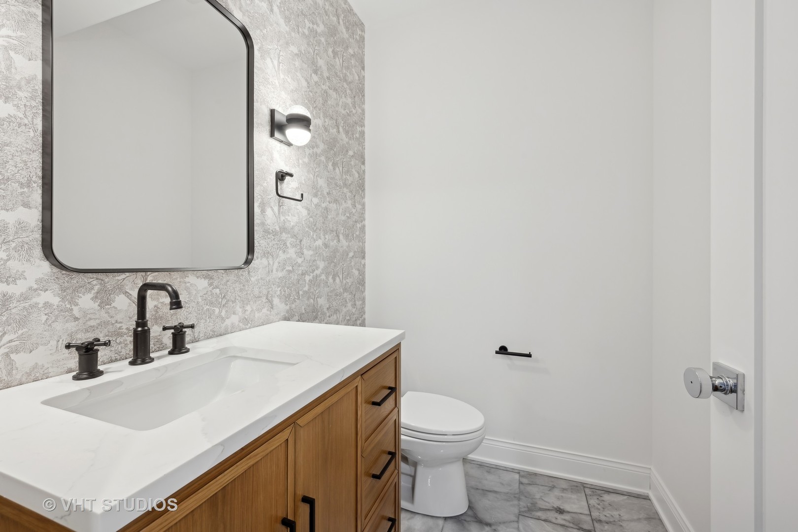 399 Ridge Avenue Winnetka, IL 60093 - Photo 41 of 45 a bathroom with a sink a toilet and mirror