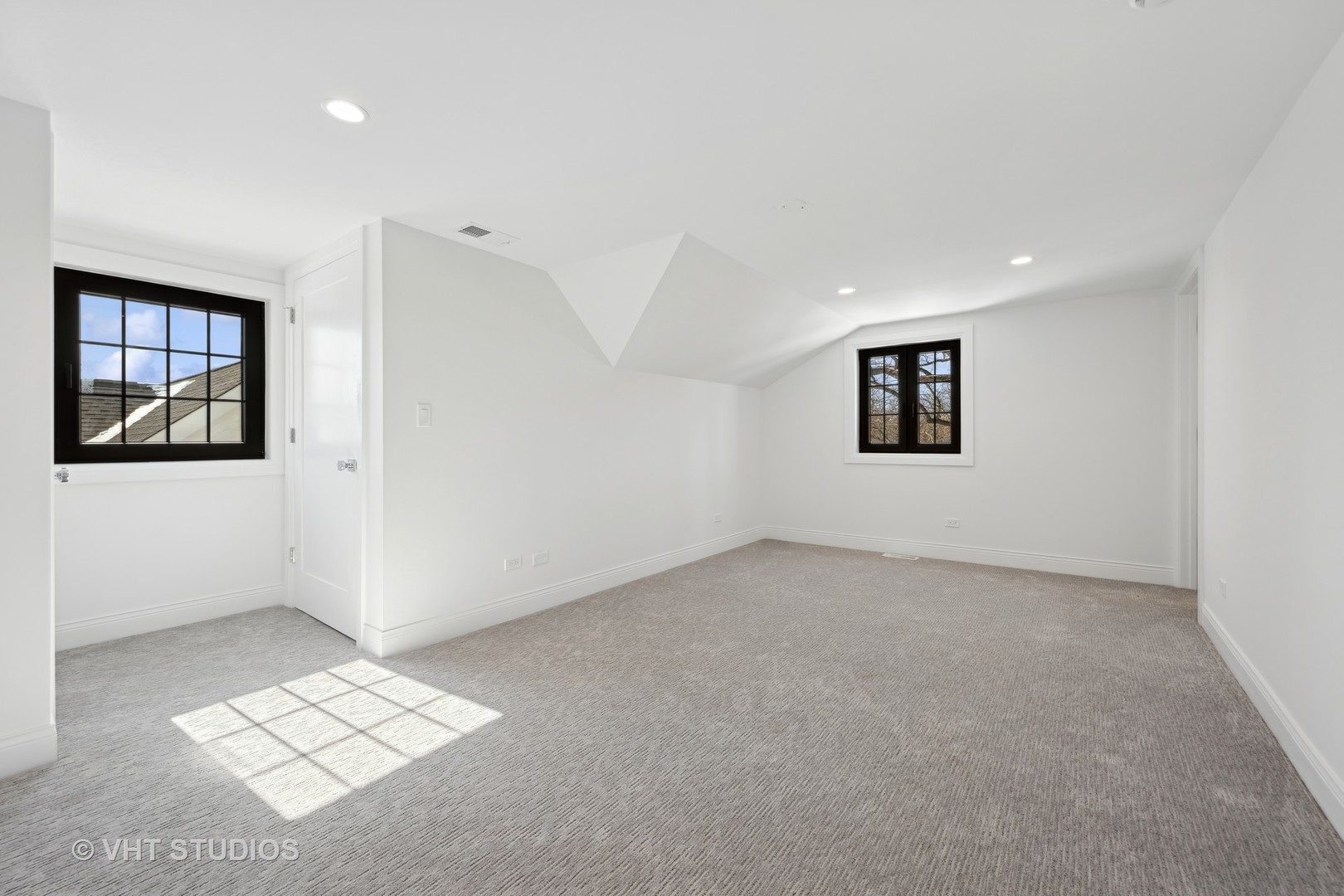 399 Ridge Avenue Winnetka, IL 60093 - Photo 44 of 45 a view of an empty room with a window and a fireplace
