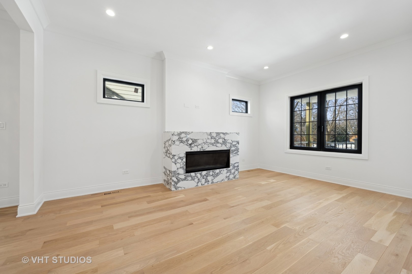 399 Ridge Avenue Winnetka, IL 60093 - Photo 8 of 45 a view of empty room with a fireplace