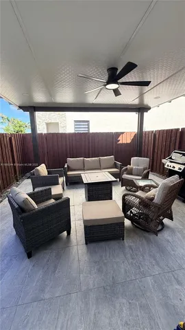 a living room with furniture and a table