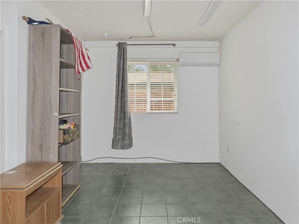 4409 Challen Avenue Riverside, CA 92503 - Photo 21 of 31 a view of an empty room with a window