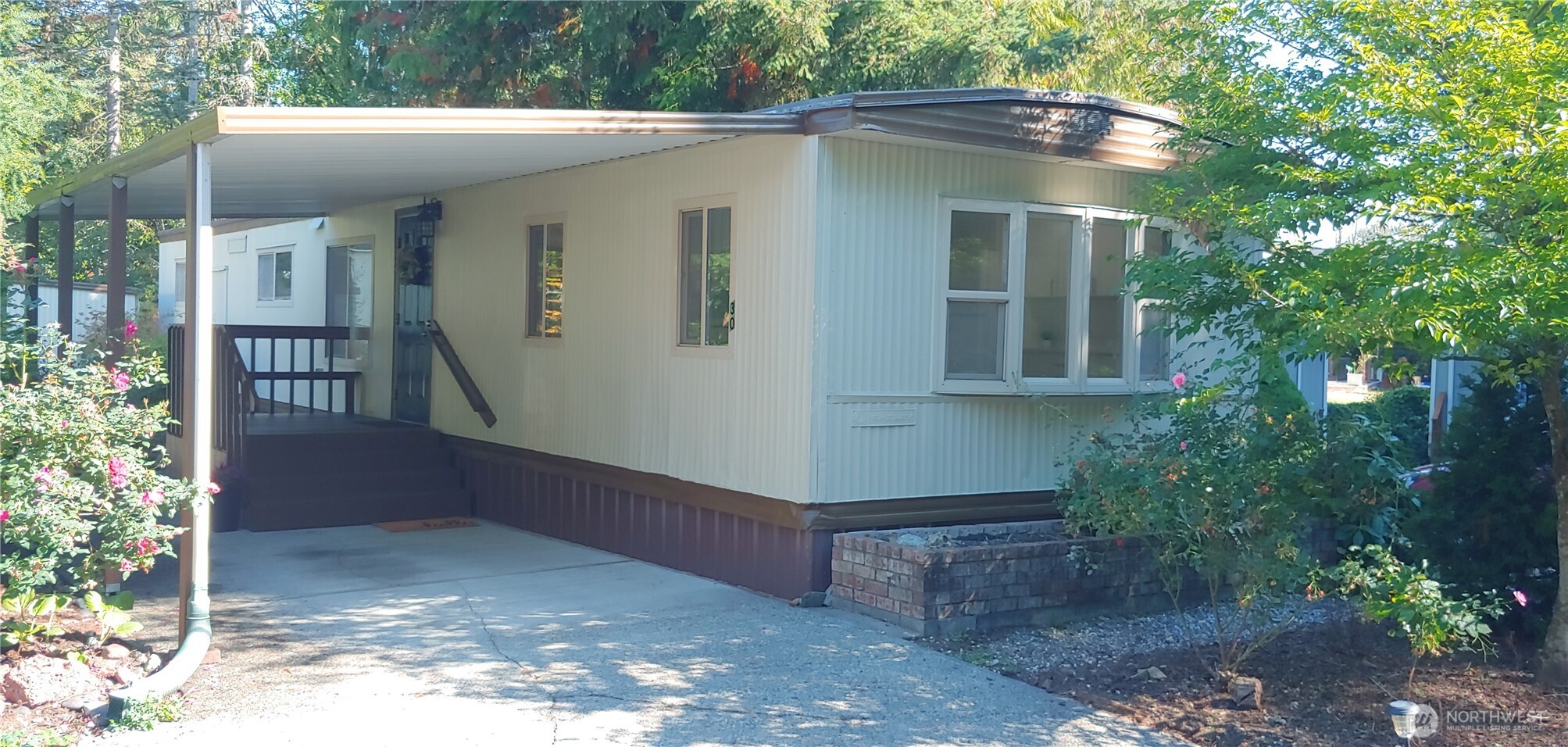 3504 Seattle Hill Road, Unit 30 Bothell, WA 98012 - Photo 16 of 23 a view of a house with a yard