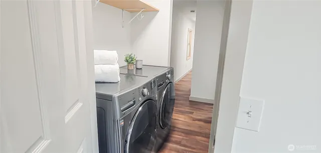 a kitchen with a sink and a refrigerator