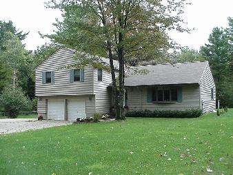978 High St Hill Road Windsor, MA 01270 - Photo 1 of 1 a view of a house with a yard and a large tree