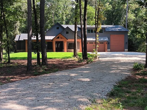 $899,000 | 12644 Grove West, Willis, TX 77378