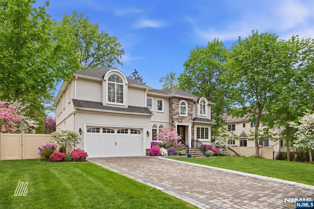 8 Ranch Lane Closter, NJ 07624 - Photo 33 of 36 a front view of house with yard and green space