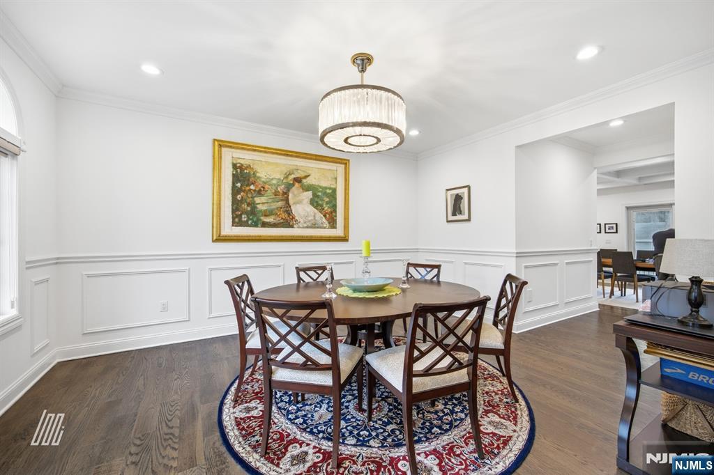 8 Ranch Lane Closter, NJ 07624 - Photo 5 of 36 a view of a dining room with furniture and wooden floor