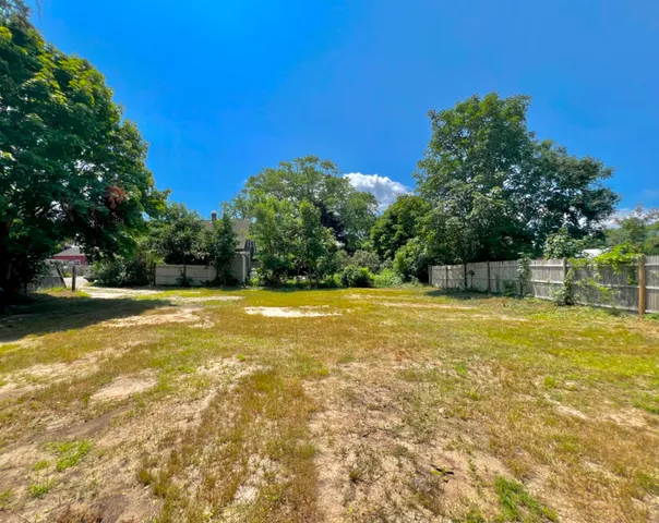 a view of a swimming pool with an outdoor space