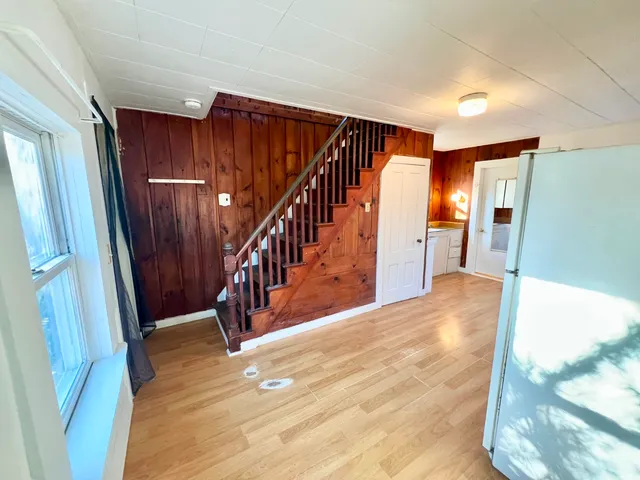 a view of entryway with wooden floor
