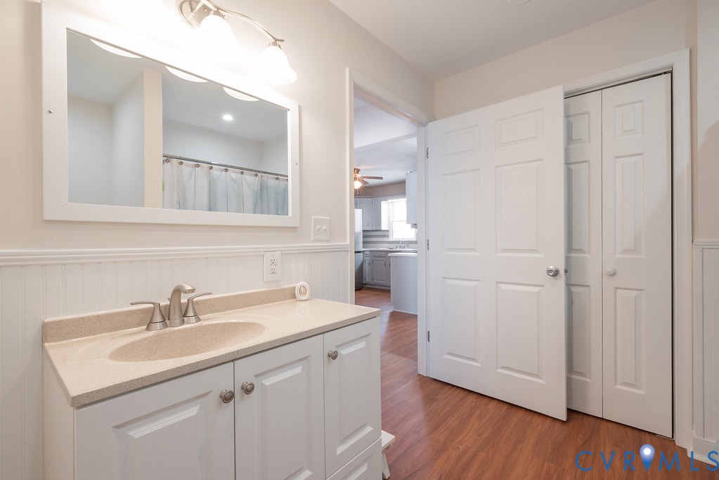 10510 Courtney Road Glen Allen, VA 23060 - Photo 18 of 44 a bathroom with a sink mirror and vanity