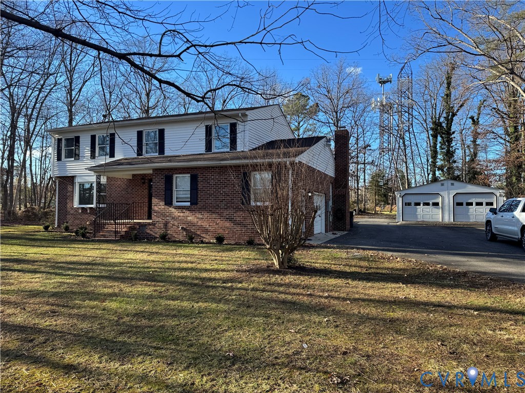 10510 Courtney Road Glen Allen, VA 23060 - Photo 2 of 44 a view of a house with a swimming pool