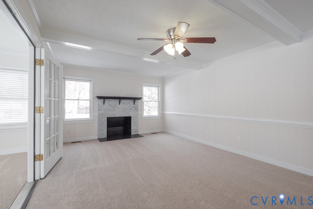 10510 Courtney Road Glen Allen, VA 23060 - Photo 21 of 44 an empty room with windows and fireplace