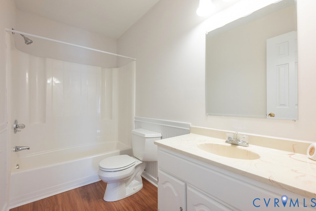 10510 Courtney Road Glen Allen, VA 23060 - Photo 28 of 44 a bathroom with a sink a toilet and a bathtub