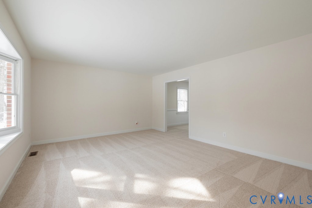 10510 Courtney Road Glen Allen, VA 23060 - Photo 6 of 44 a view of an empty room and window