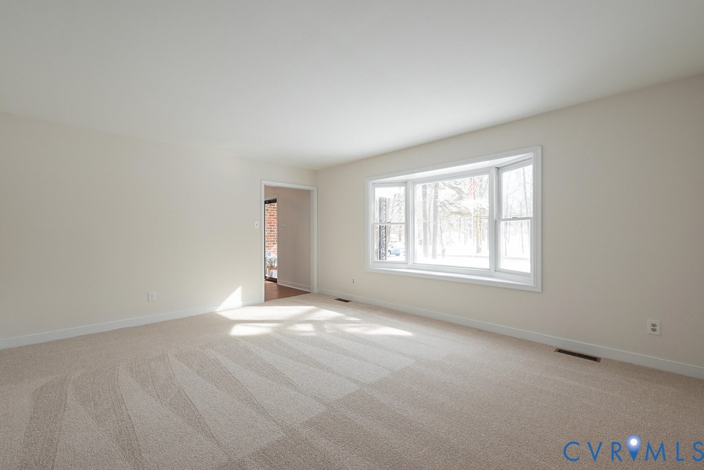10510 Courtney Road Glen Allen, VA 23060 - Photo 7 of 44 an empty room with windows