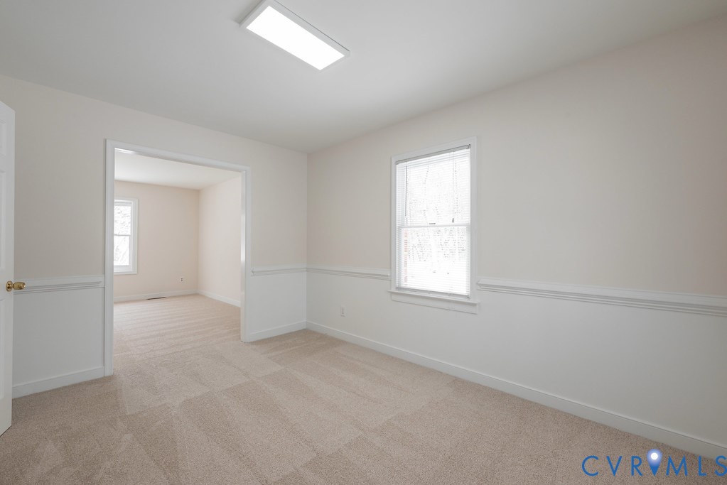 10510 Courtney Road Glen Allen, VA 23060 - Photo 9 of 44 an empty room with windows and closet