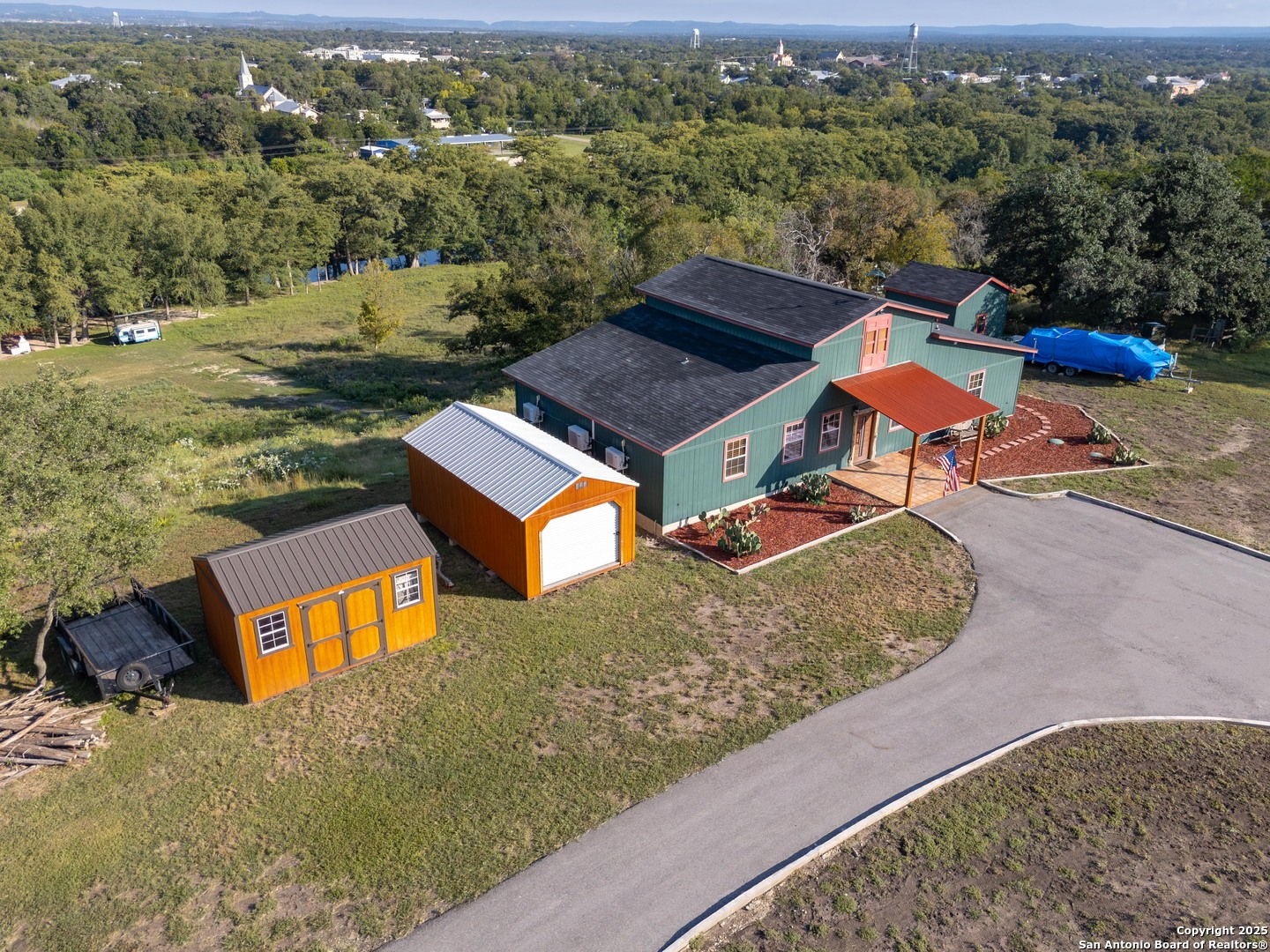 170 Teich Lane Bandera, TX 78003 - Photo 3 of 11 an aerial view of residential houses with yard