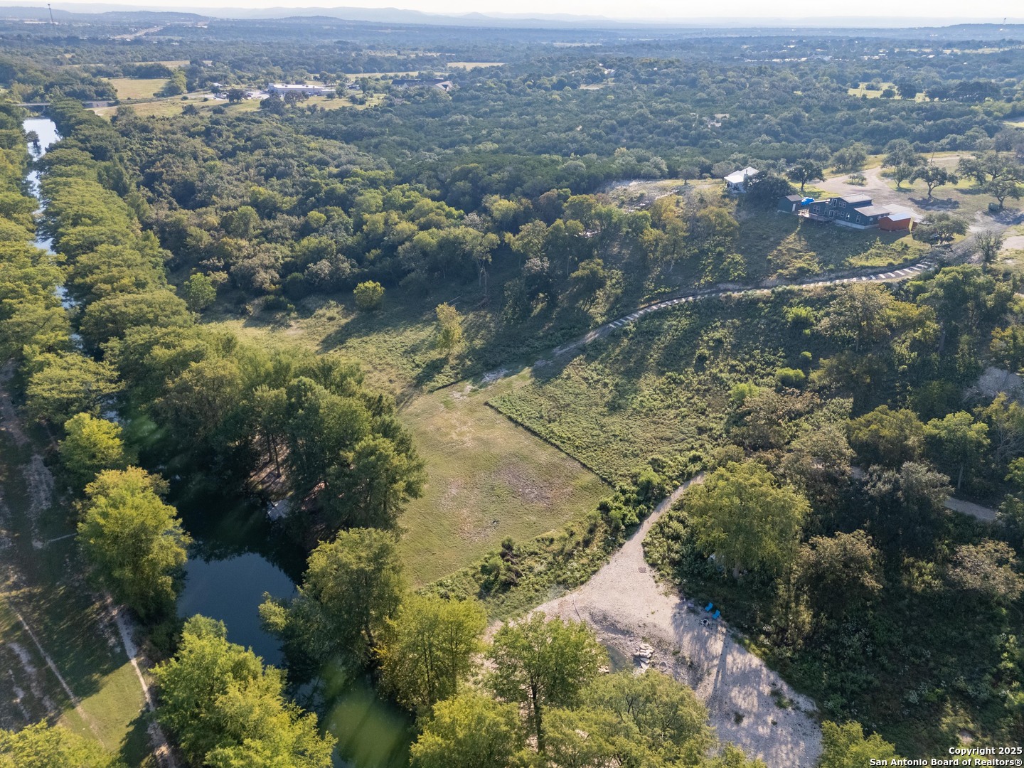 170 Teich Lane Bandera, TX 78003 - Photo 4 of 11 an aerial view of residential houses with outdoor space