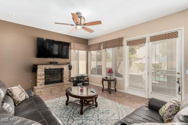 a dining room with furniture and window