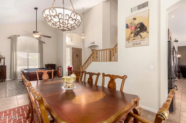 a view of a dining room with furniture window and outside view
