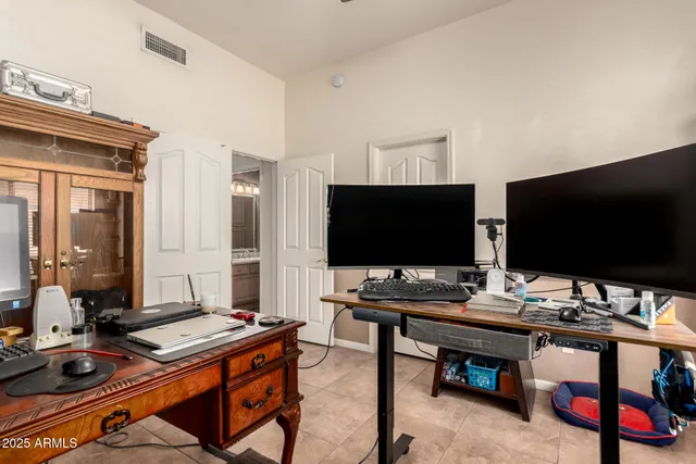 a view of a balcony with furniture