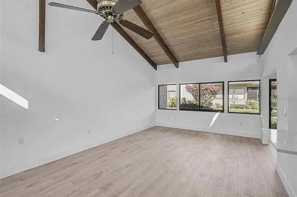 an empty room with windows