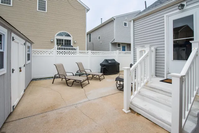 a view of a house with wooden floor and furniture