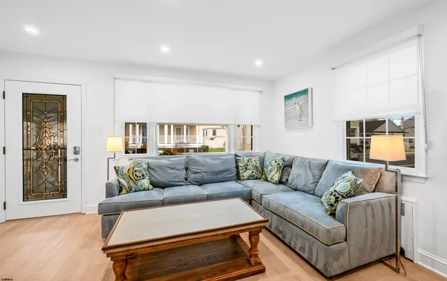 a living room with furniture and a couch