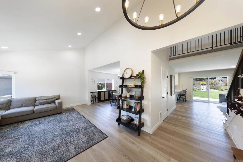 3577 Winslow Road Oceanside, CA 92056 - Photo 5 of 53 a view of a livingroom with furniture and a floor to ceiling window