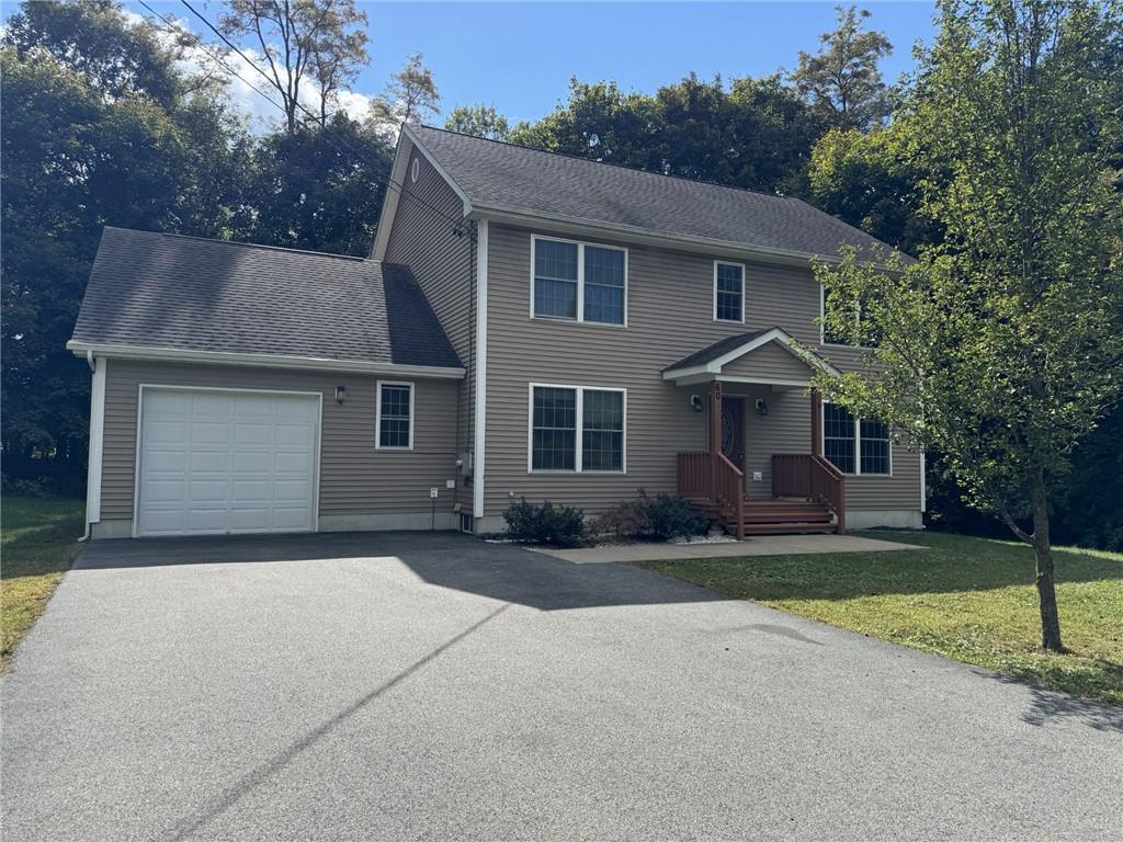 60 East Cedar Street Poughkeepsie, NY 12601 - Photo 1 of 1 Colonial home with a garage and a front yard