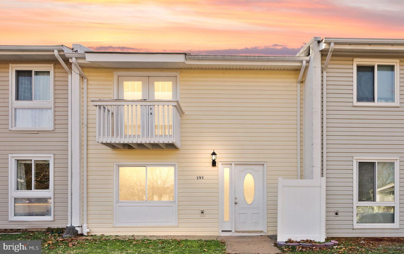 191 North Cottage Road Sterling, VA 20164 - Photo 2 of 41 a front view of a house with a yard