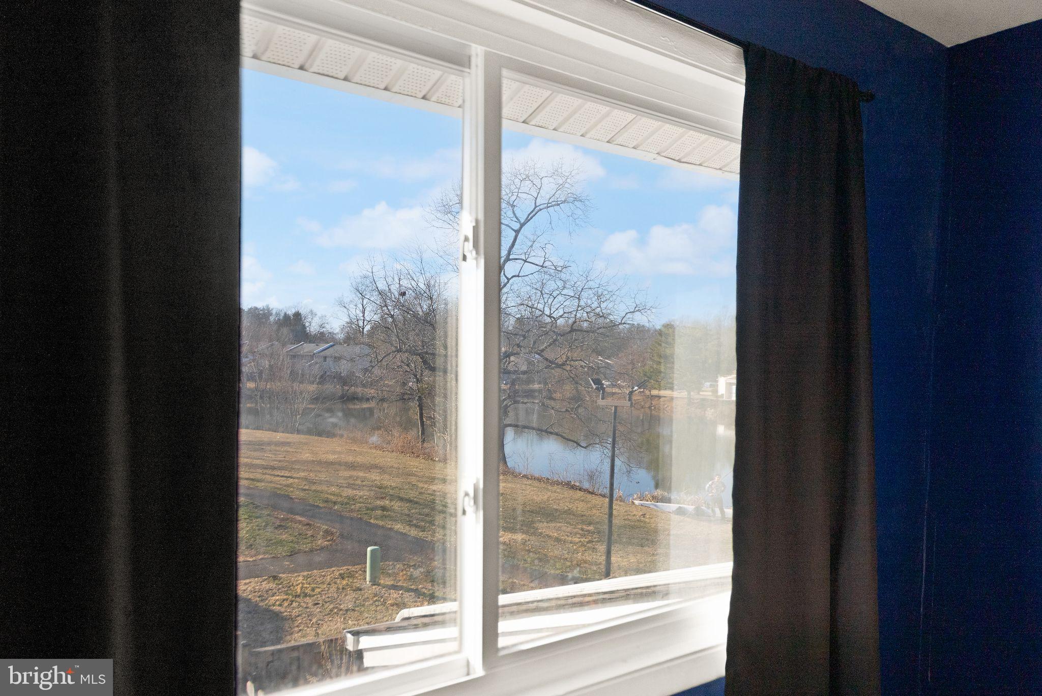 191 North Cottage Road Sterling, VA 20164 - Photo 21 of 41 a view of a glass door and a window