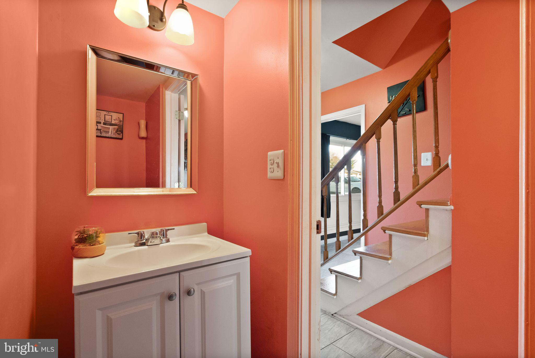 191 North Cottage Road Sterling, VA 20164 - Photo 7 of 41 a bathroom with a sink and a mirror