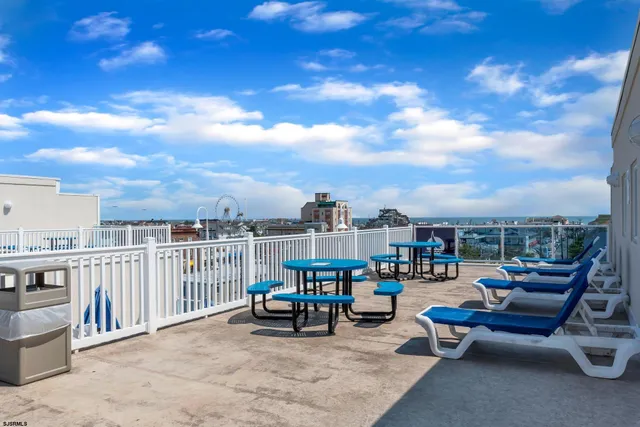 a view of a terrace with sitting area