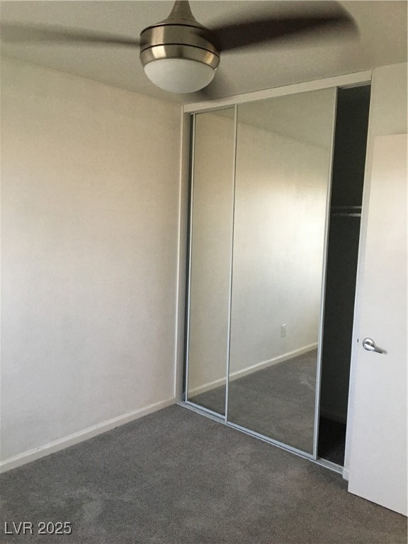 973 Cedar Pines Street Henderson, NV 89011 - Photo 26 of 37 Unfurnished bedroom with dark carpet and a closet