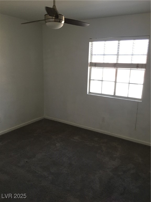 973 Cedar Pines Street Henderson, NV 89011 - Photo 28 of 37 Unfurnished room featuring dark carpet and ceiling fan