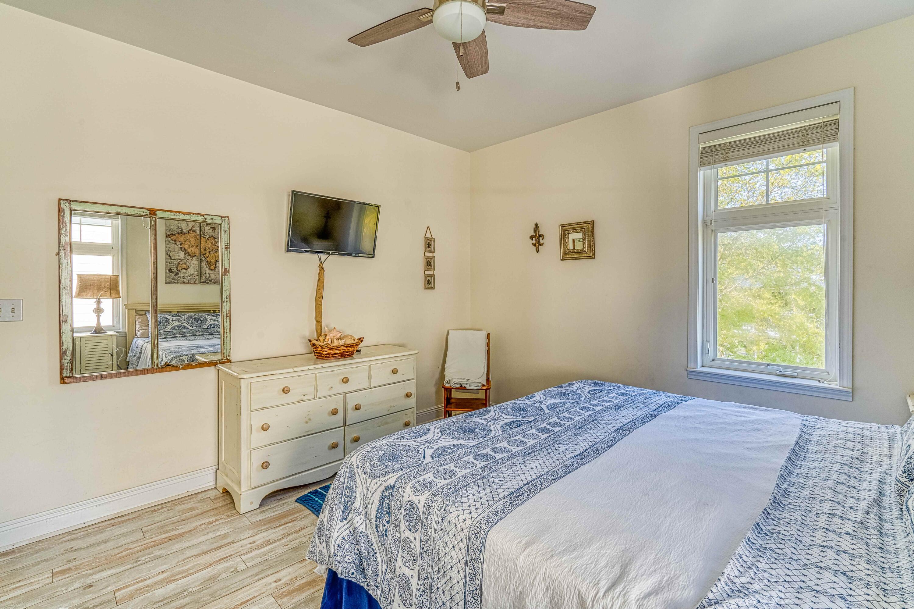 51 Redfish Circle Santa Rosa Beach, FL 32459 - Photo 10 of 17 a bedroom with a bed and a dresser